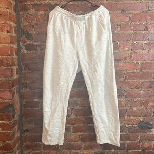 Grey joggers with zipper.